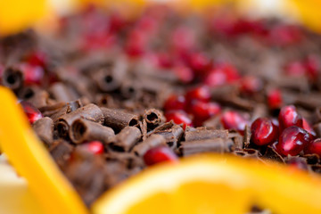Closeup of milk chocolate chips and pomegranate mix