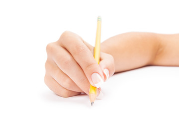 a pencil in a hand is isolated on a white background