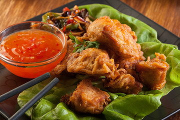 Fried chicken pieces in batter