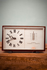 Old clock and barometer