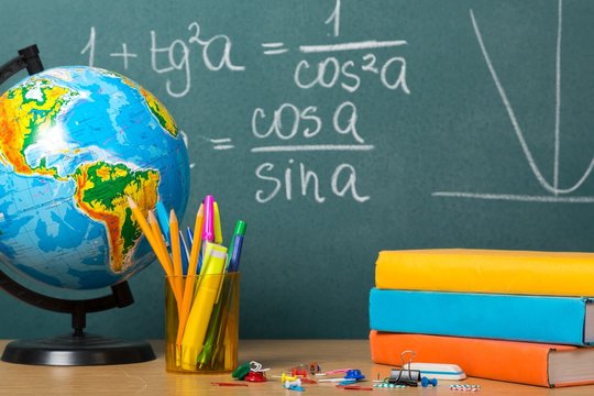 School. Back to school - blackboard with pencil-box and school