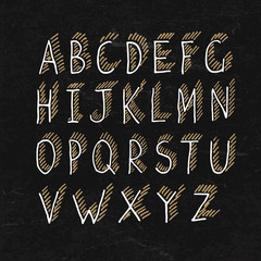 Fototapeta na wymiar Hand-drawn Shadowed Alphabet on BlackBoard Texture
