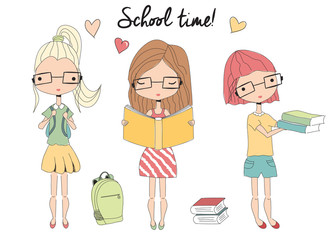 Three young school girls with glasses, school bag, books