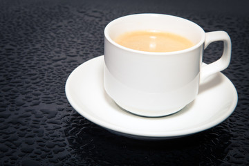 cup coffee on the black background