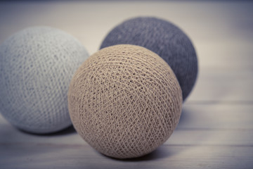 collection of colourful wool balls on white background