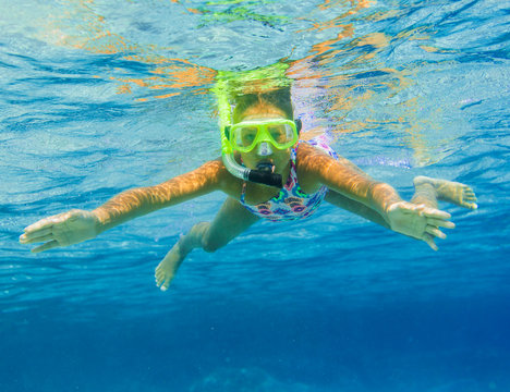 Underwater girl snorkeling