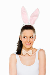 Cute woman with bunny ears isolated on white