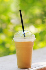 Inviting iced drink in a covered cup