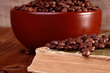 Coffee beans on book
