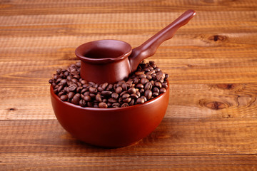 Coffee beans in bowl with Finjan