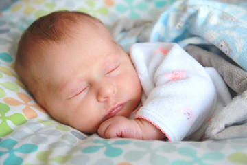 Cozy Sleeping Newborn Baby Girl