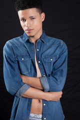 Man looking thoughtful with open shirt