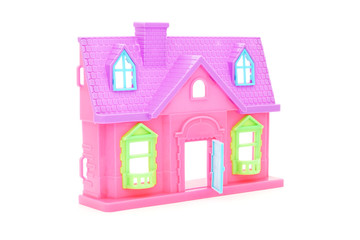 pink plastic doll house with opened door on white background