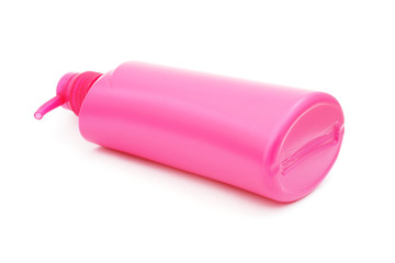 pink plastic pump cosmetic bottle on white background