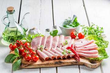 Tasty ham with herbs and pepper