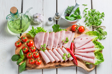 Tasty ham with pepper and herbs © shaiith