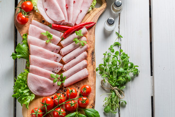 Smoked cold cuts with pepper and herbs