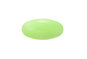 Macro green medical pill tablet isolated on white