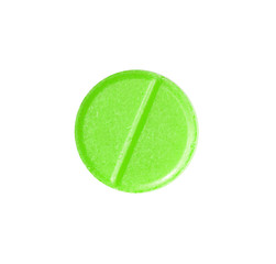 Macro green medical pill tablet isolated on white