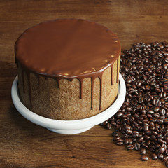 Delicious chocolate vegan cake, coffee beans pile on wooden