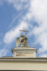 Fototapeta na wymiar Stone Angel on the church in St. Peterburg