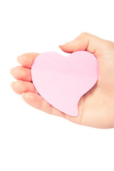 Obraz premium a cardboard heart is in a hand