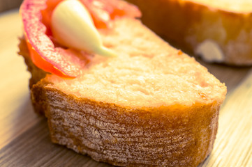 Tapas with tomato and garlic on a baguette