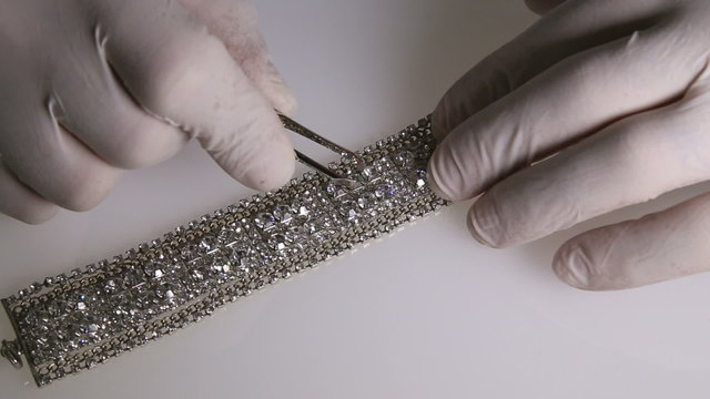 Jeweler In His Studio Working With Diamonds