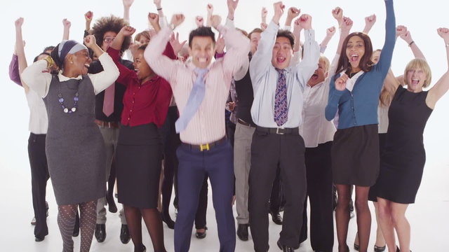 Happy mixed ethnicity group jumping for joy on white background in studio shot