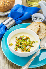 Corn soup with eggs and peppers.