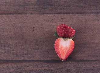 Strawberry fruitson grunge wooden background