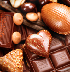 Chocolates background. Praline chocolate sweets