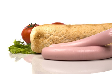 Fresh hot bun hot dog with tomato and sausage