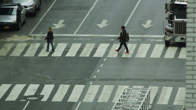Overhead view of pedestrians crossing on a New York city street