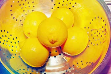 lemons in metal colander