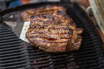 Beef steak on spatula BBQ grilled