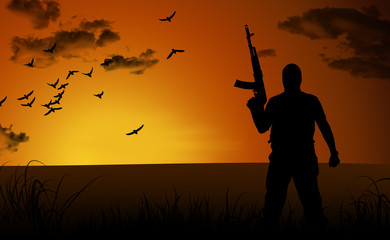 Silhouette of a lone soldier suicide at sunset