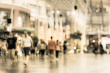 Blurred people walking in the shopping mall