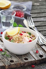 Quinoa salad with steamed salmon,chickpea and pomegranate.