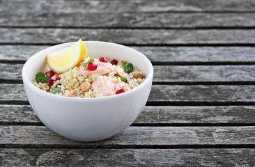 Quinoa salad with steamed salmon,chickpea and pomegranate.