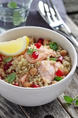 Quinoa salad with steamed salmon,chickpea and pomegranate.