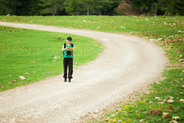 Fototapeta premium Hiker looking on map