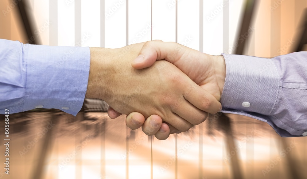 Poster Composite image of hand shake in front of wires