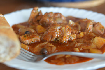 Goulash On The White Plate And Bread