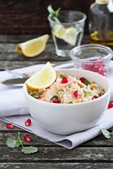 Quinoa salad with steamed salmon,chickpea and pomegranate.