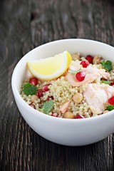 Quinoa salad with steamed salmon,chickpea and pomegranate.