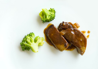 grilled foie gras with Broccoli on white dish © iTons