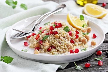 Quinoa salad with chickpea and pomegranate.Healthy eating.