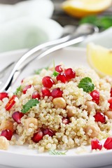 Quinoa salad with chickpea and pomegranate.Healthy eating.