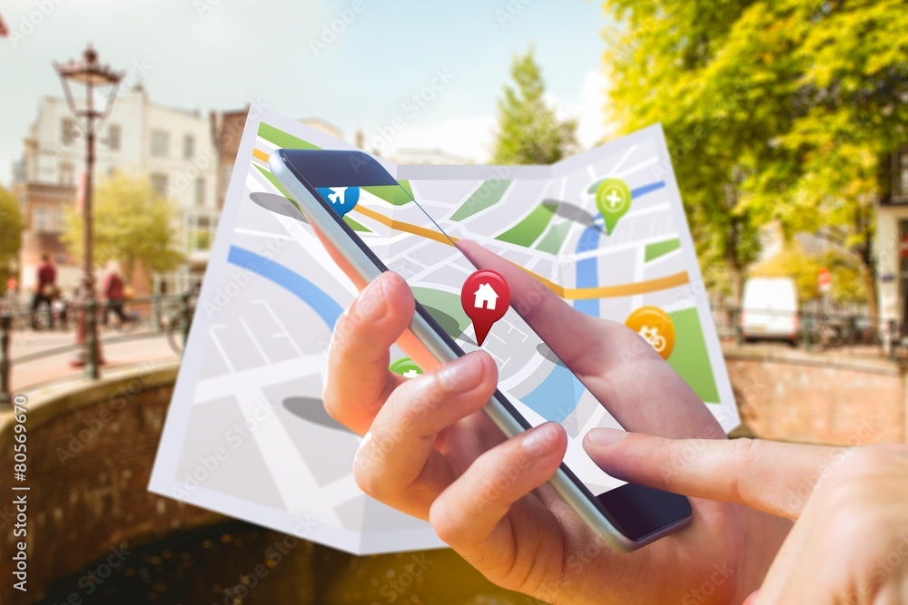 Aufkleber Composite image of man using map app on phone